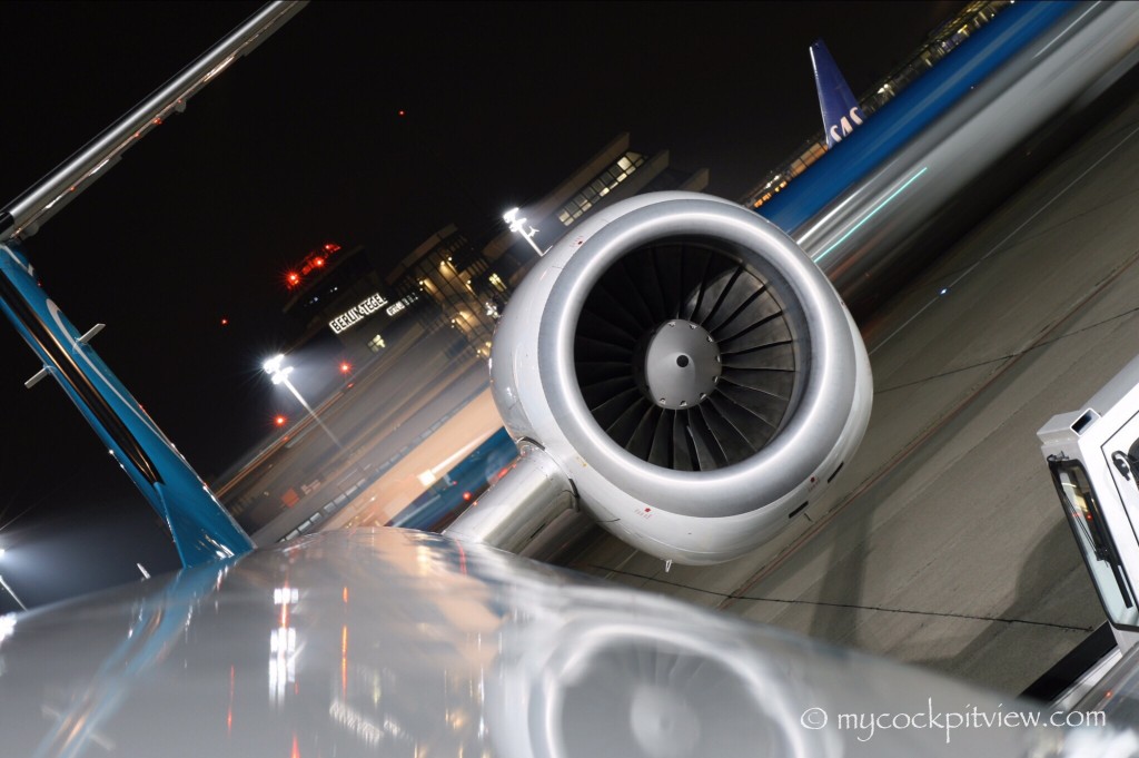 Long exposure picture in BerlinTegel Airport. Engine of Luxair Embraer 145.