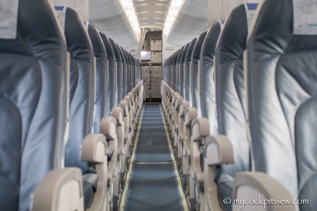 Luxair Bombardier Dash 8 Q400, passenger cabin. Mycockpitview